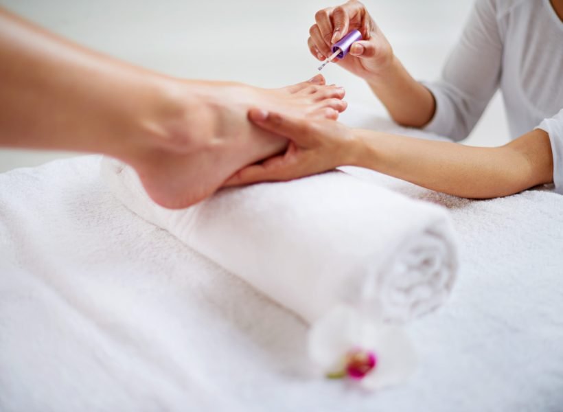 Relaxing pedicure. Closeup shot of a woman getting a pedicure in a health spa