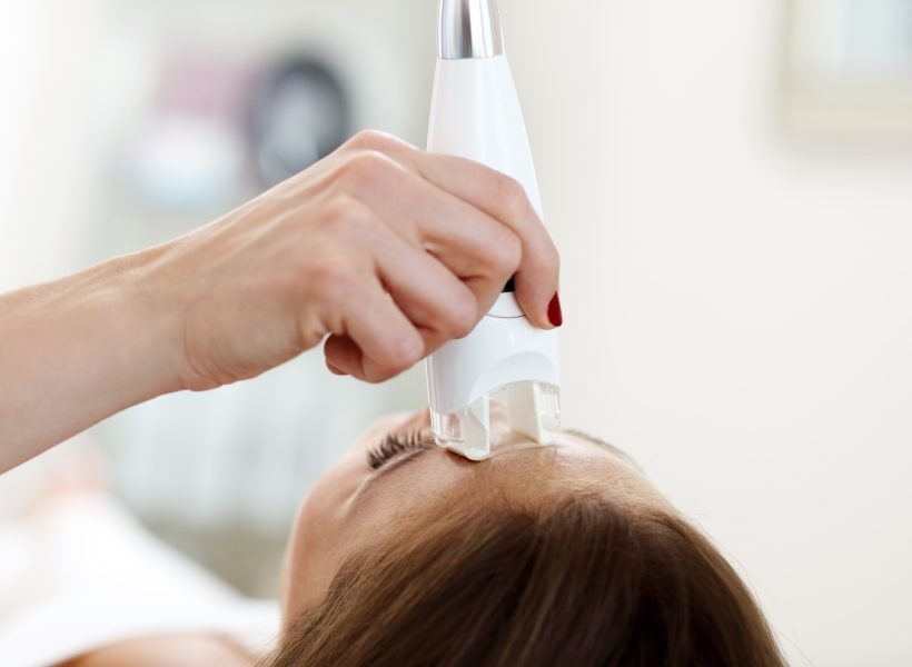 Picture of woman having facial treatment in beauty salon